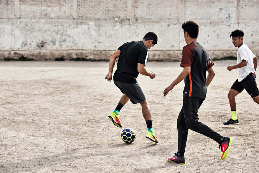 Street Soccer Action Shot.jpg Wallpaper