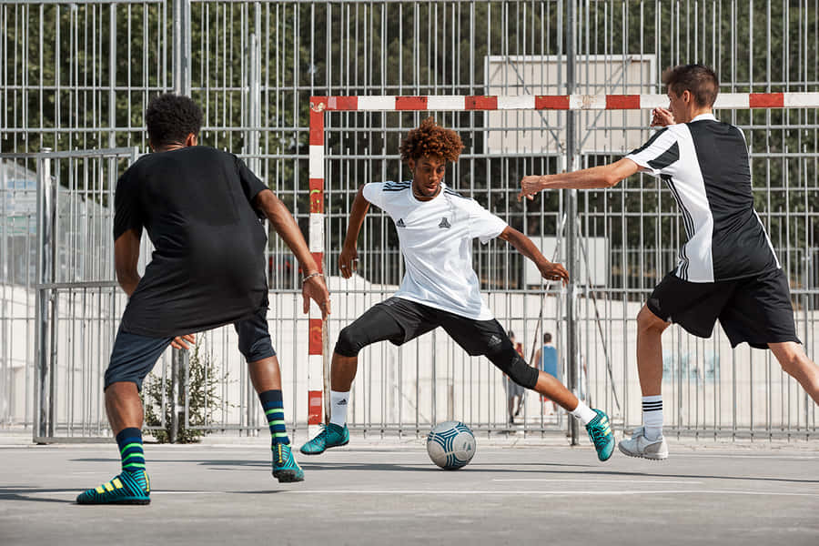 Street Soccer Action Shot.jpg Wallpaper