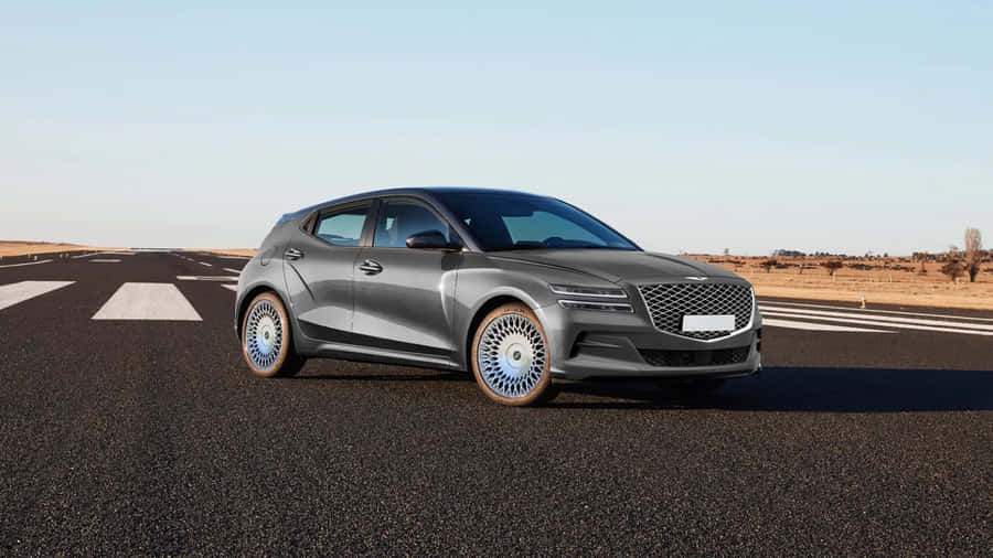 Striking And Stylish Genesis Gv60 On The Road Wallpaper