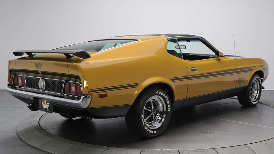 Striking Ford Mustang Mach 1 On Open Road Wallpaper