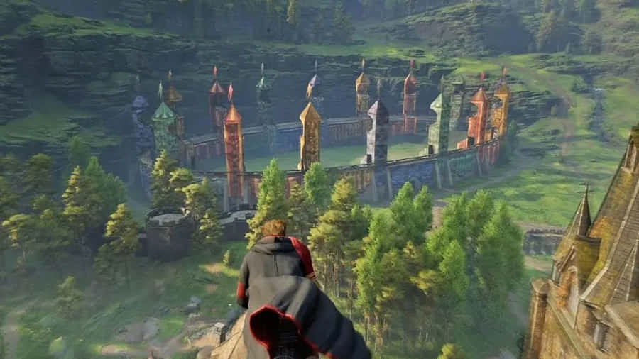 Stuart Granger Taking A Shot At The Hogwarts Quidditch Pitch Wallpaper