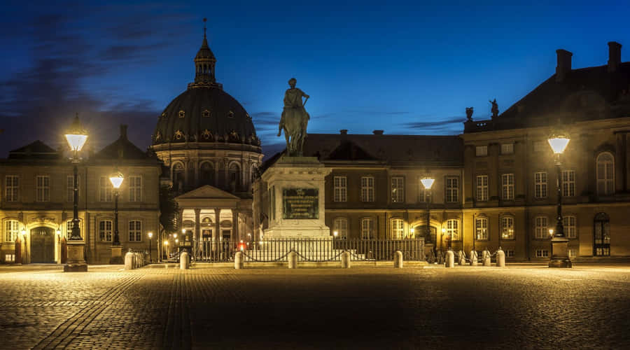 Stuctures At Amalienborg Palace Visible At Night Wallpaper