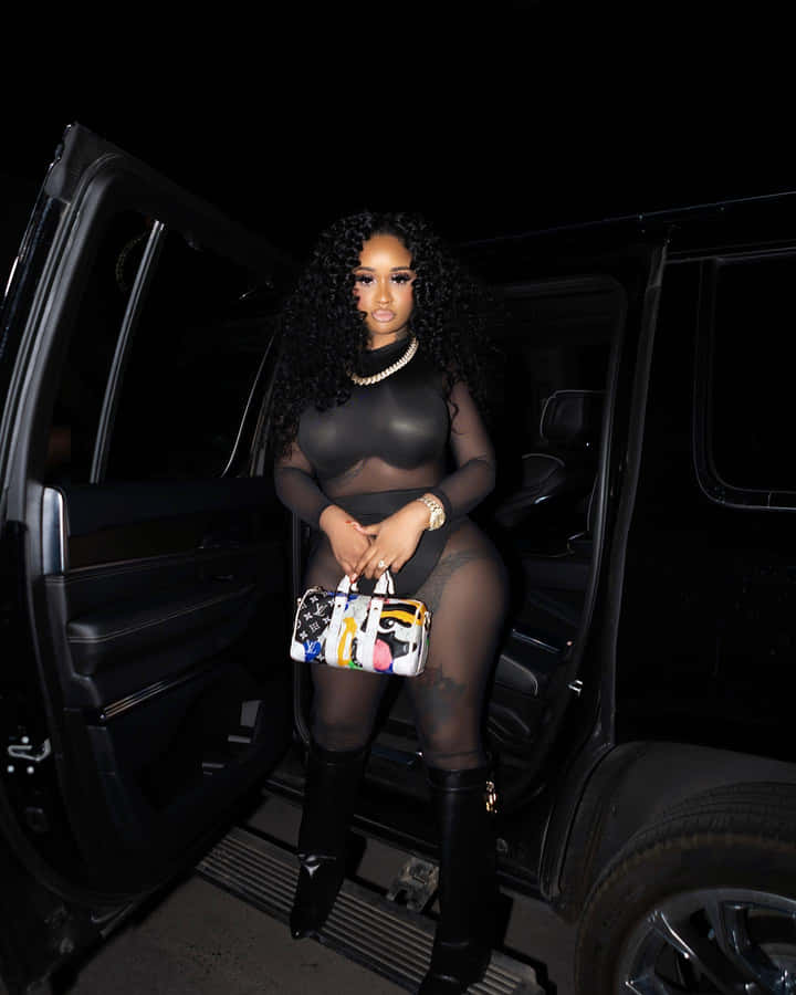 Stunna Girl Posingwith Luxury Carat Night Wallpaper