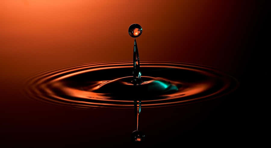 Stunning 3d Water Splash On A Serene Ocean Surface Wallpaper