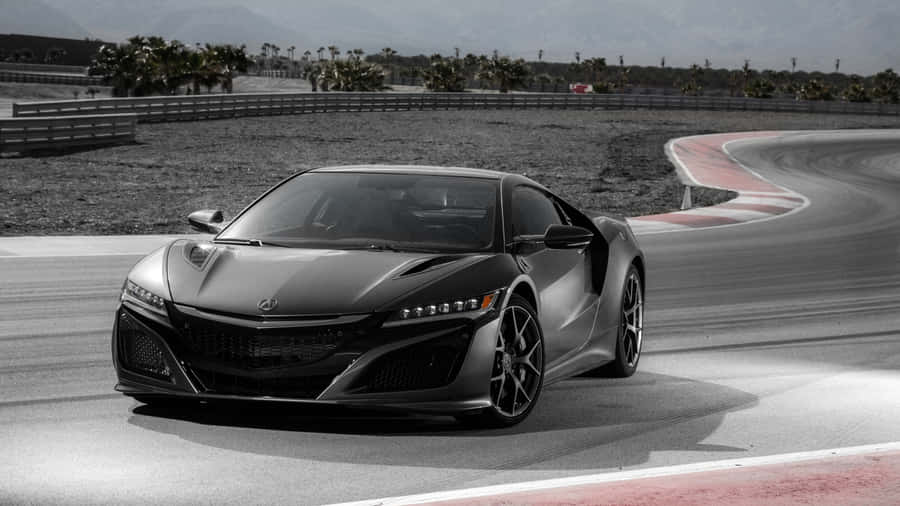 Stunning Acura Nsx In Motion On The Open Road Wallpaper