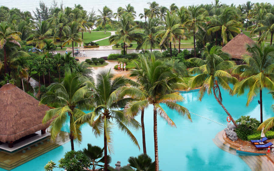 Stunning Beach Resort At Sunset Wallpaper