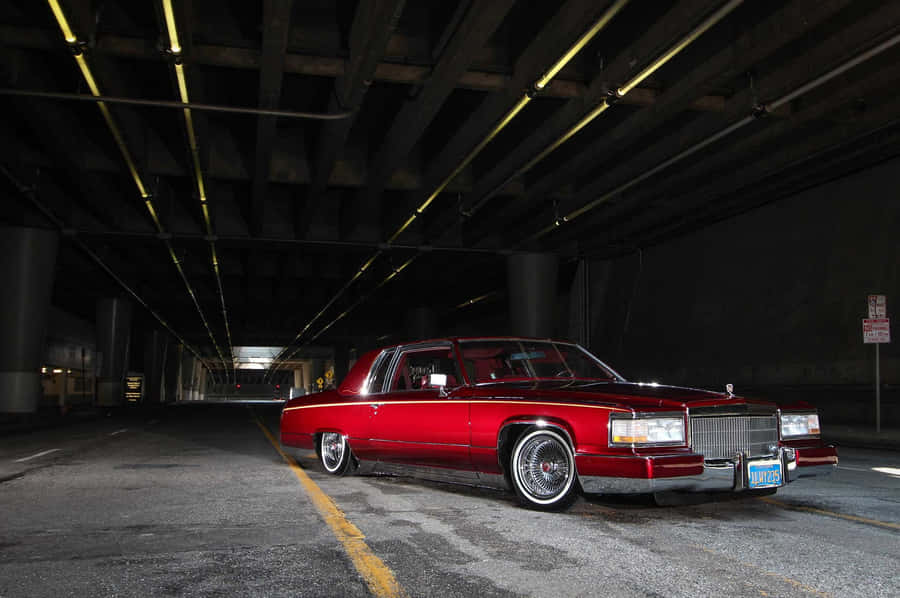 Stunning Cadillac Deville Sedan In Twilight Wallpaper