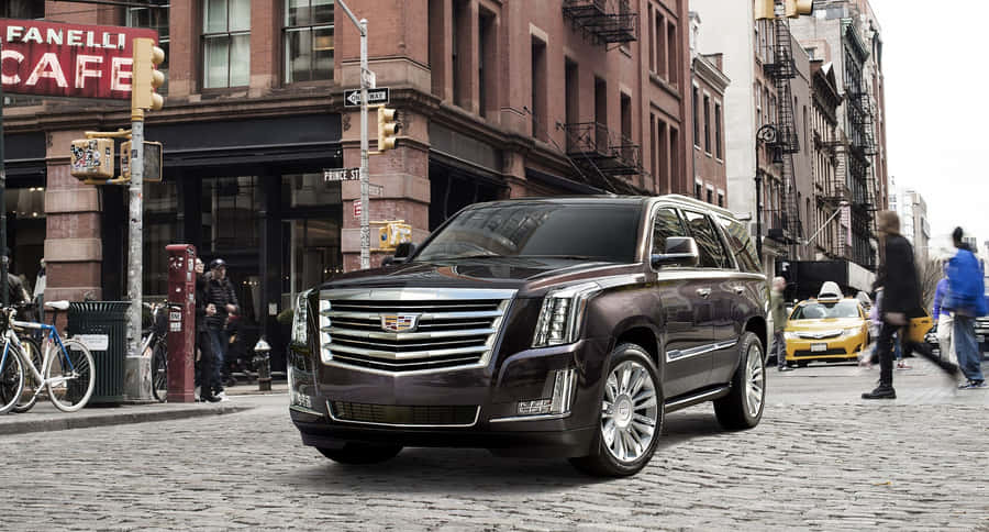 Stunning Cadillac Escalade On Urban Landscape Wallpaper