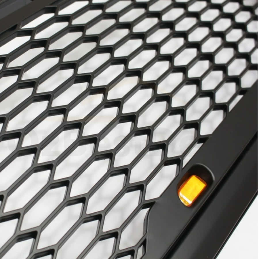Stunning Close-up Of A Car Grill Wallpaper