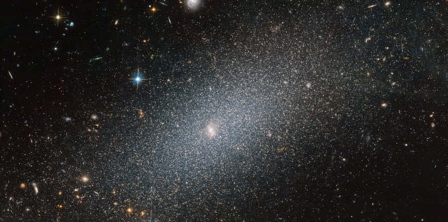 Stunning Elliptical Galaxy In Deep Space Wallpaper
