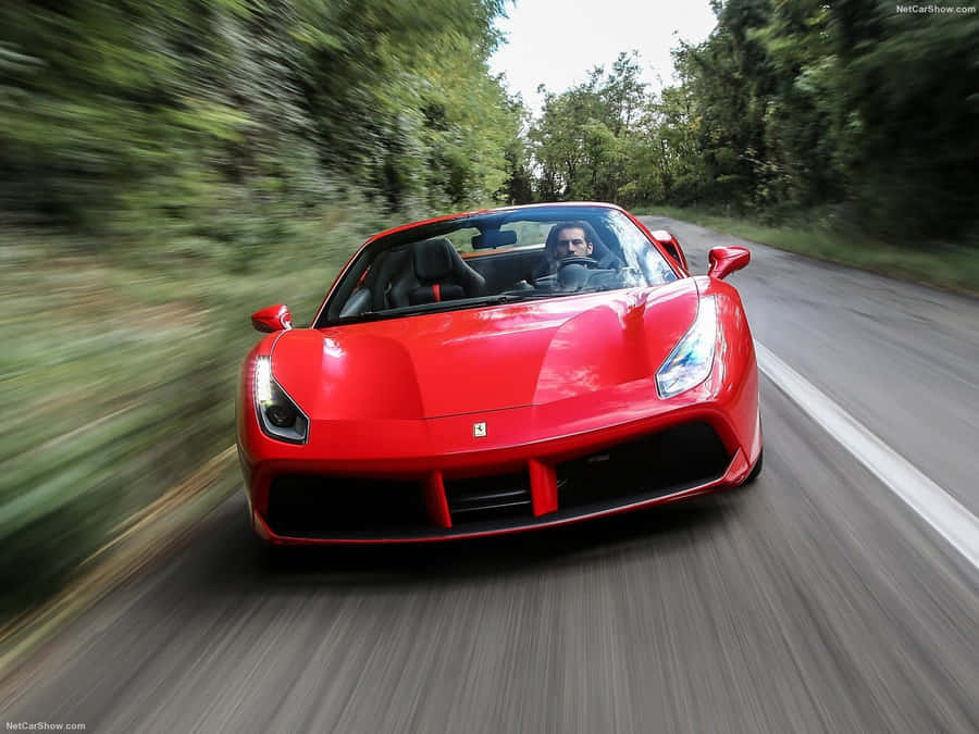 Stunning Ferrari 488 Spider Cruising The Open Road Wallpaper