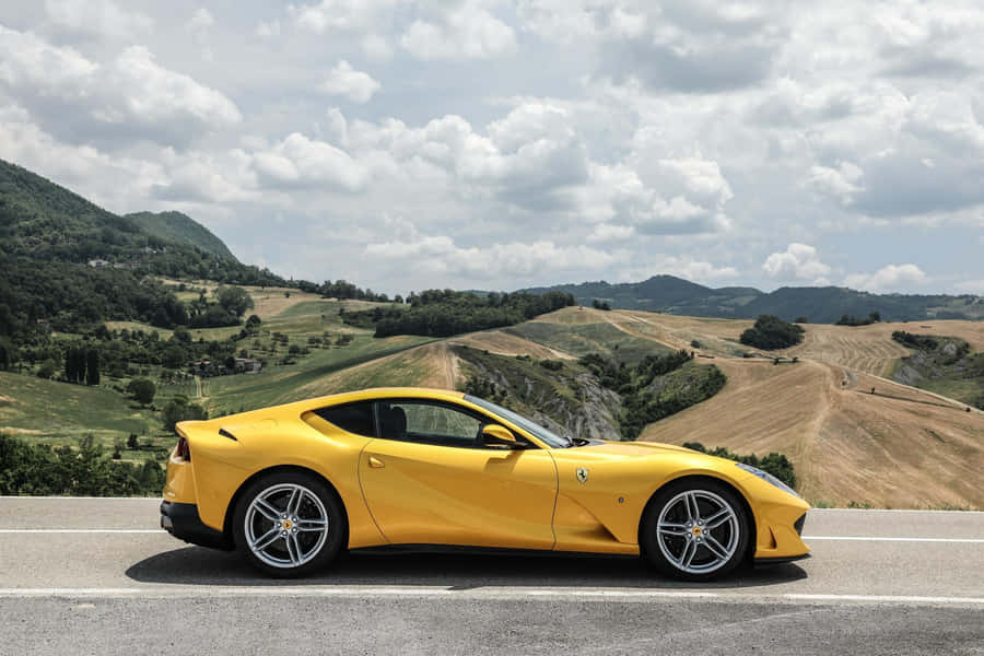 Stunning Ferrari 812 Superfast On The Road Wallpaper