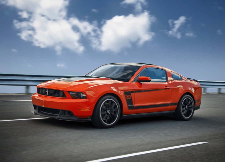 Stunning Ford Mustang Boss 302 Speeding On A Highway Wallpaper