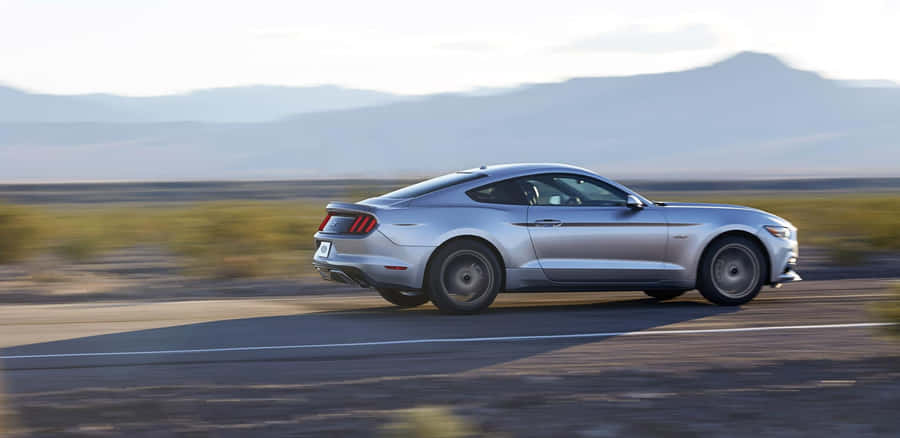 Stunning Ford Mustang California Special Cruising On An Open Road Wallpaper