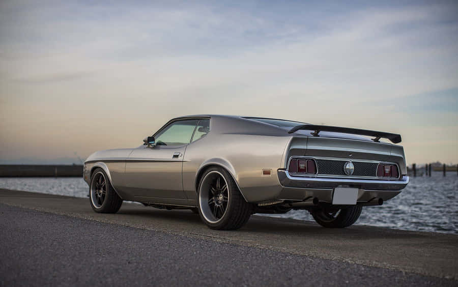 Stunning Ford Mustang Mach 1 In Action Wallpaper