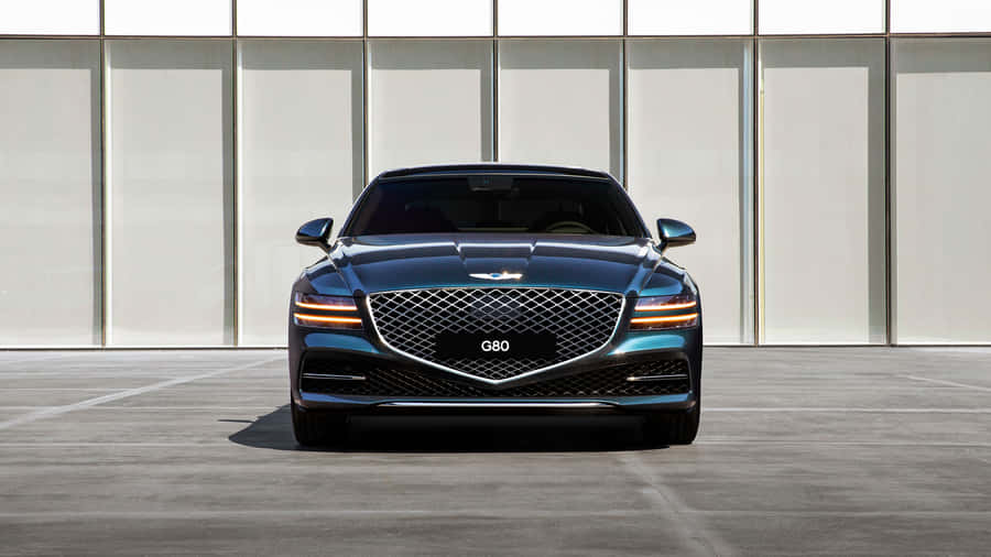 Stunning Genesis G80 Sedan In A Majestic Setting Wallpaper