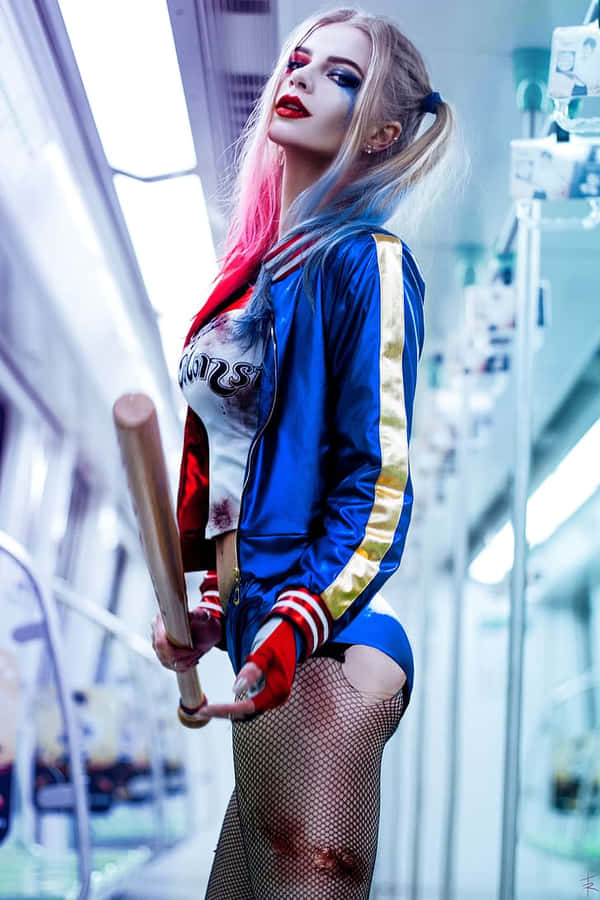 Stunning Harley Quinn Cosplay In Action Wallpaper