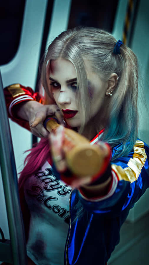 Stunning Harley Quinn Cosplay In Action Wallpaper