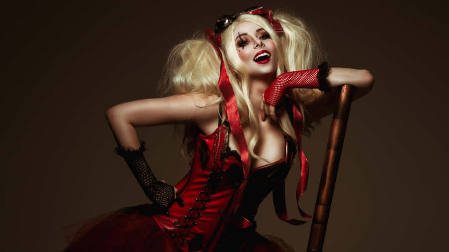 Stunning Harley Quinn Cosplay Poses Fiercely In A Realistic Costume. Wallpaper