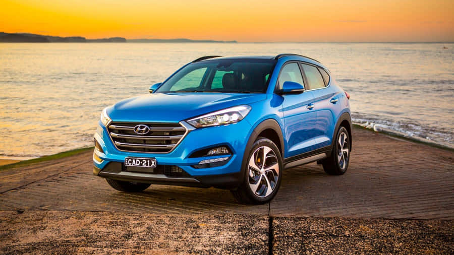 Stunning Hyundai Tucson In Scenic Landscape Wallpaper