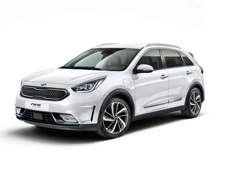 Stunning Kia Niro Parked Outdoors In A Beautiful Setting Wallpaper