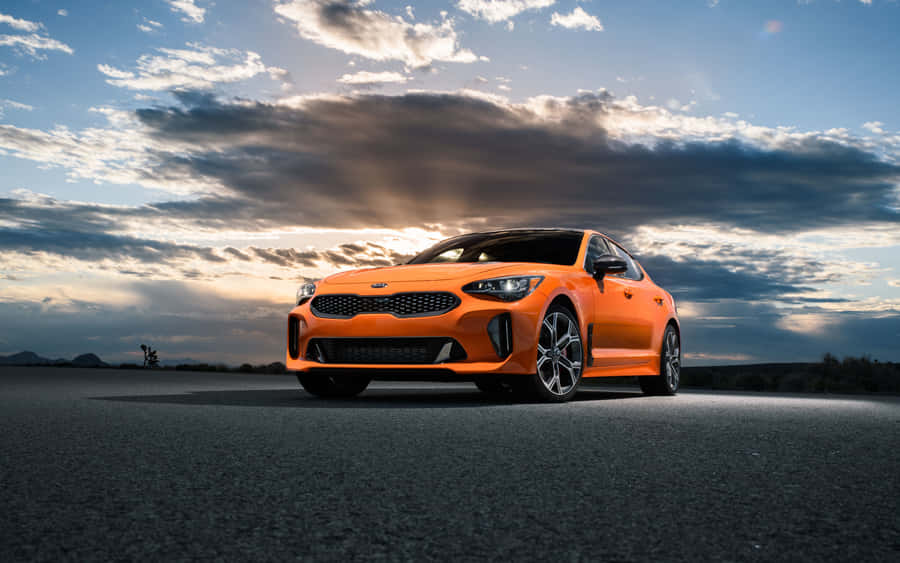 Stunning Kia Stinger In Action On The Road Wallpaper