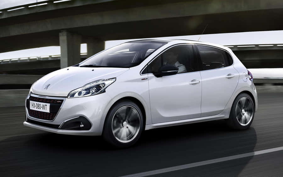 Stunning New Peugeot 208 In An Urban Setting Wallpaper