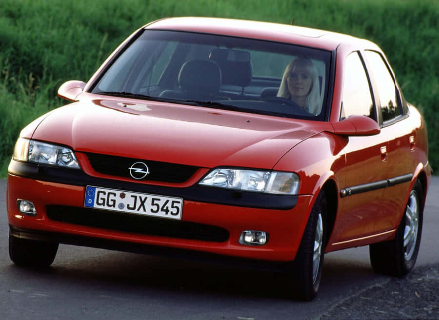 Stunning Opel Vectra Gliding On The Road. Wallpaper