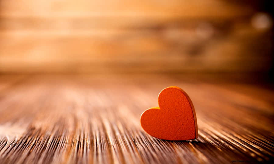 Stunning Orange Heart Vibrantly Glowing Wallpaper