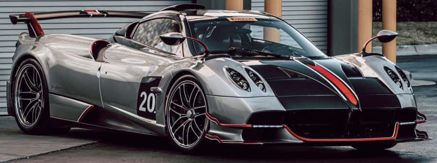 Stunning Pagani Zonda C12 Roadster In A Scenic Landscape Wallpaper