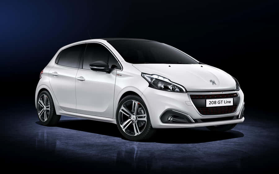 Stunning Peugeot 208 In Dynamic Urban Setting Wallpaper