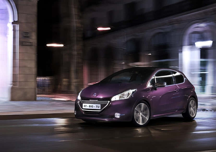Stunning Peugeot 208 Vehicle Accelerating On A Scenic Highway Wallpaper