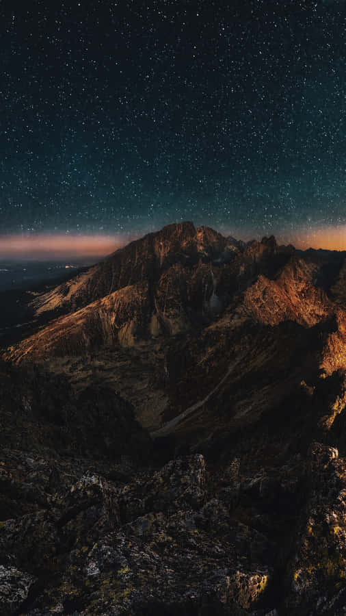 Stunning Qled Display In A Vibrant Living Room Setting Wallpaper