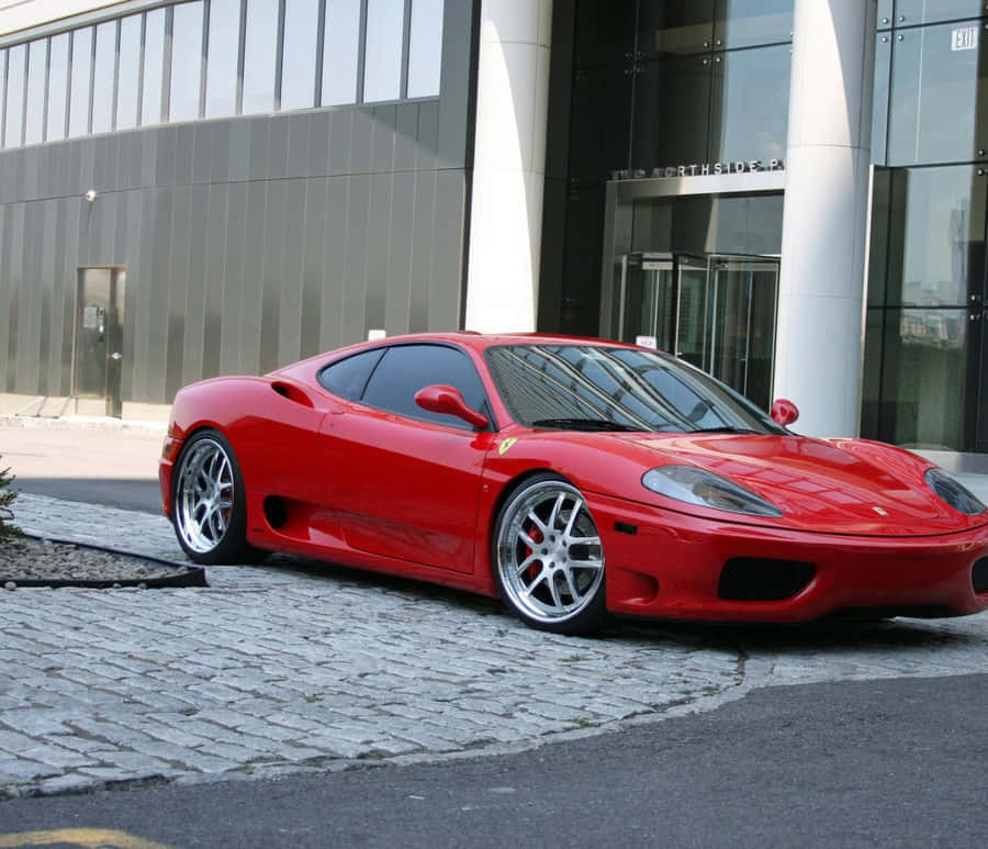 Stunning Red Ferrari 360 Modena, Parked And Ready For Adventure Wallpaper