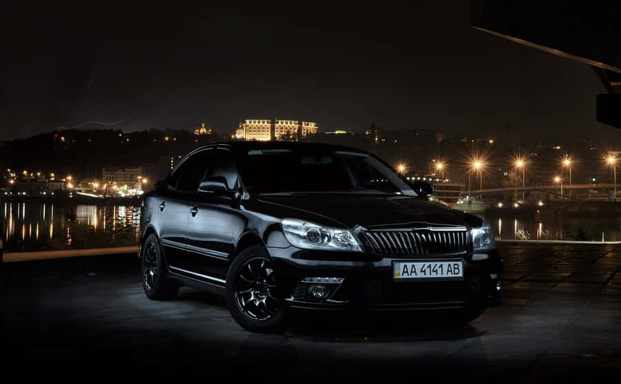 Stunning Silver Skoda Rapid In Motion Wallpaper