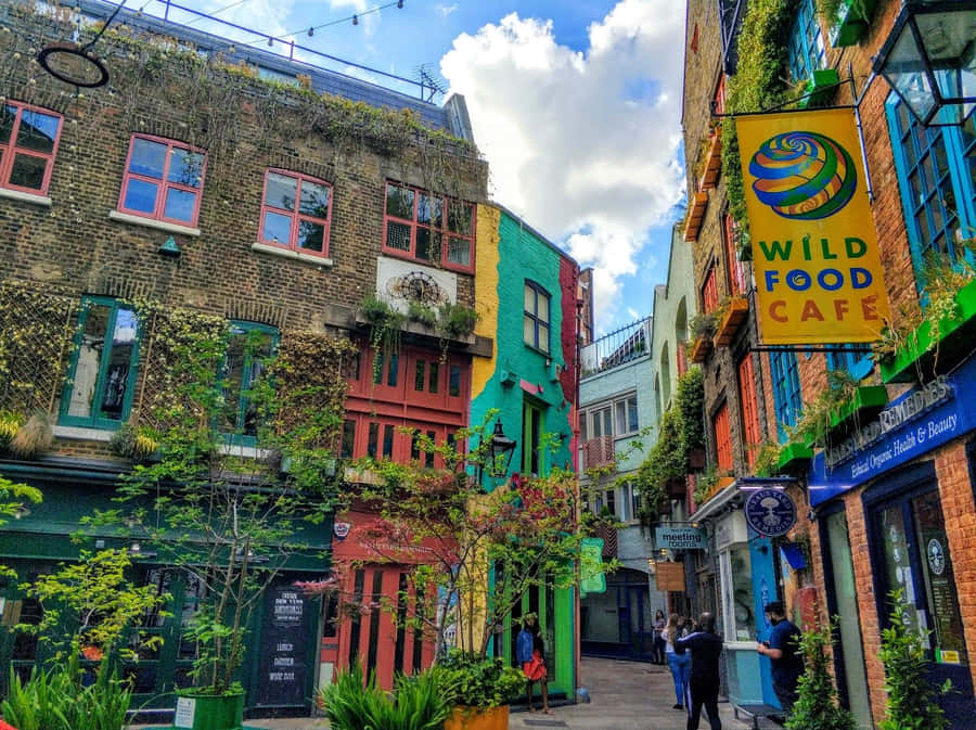 Stunning Skyline Of A Vibrant City By The Waterfront Wallpaper