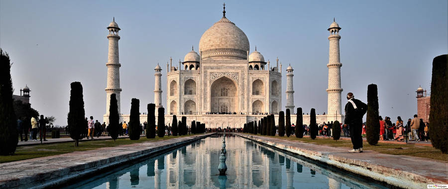 Stunning Sunset Over A Serene Asian River Wallpaper