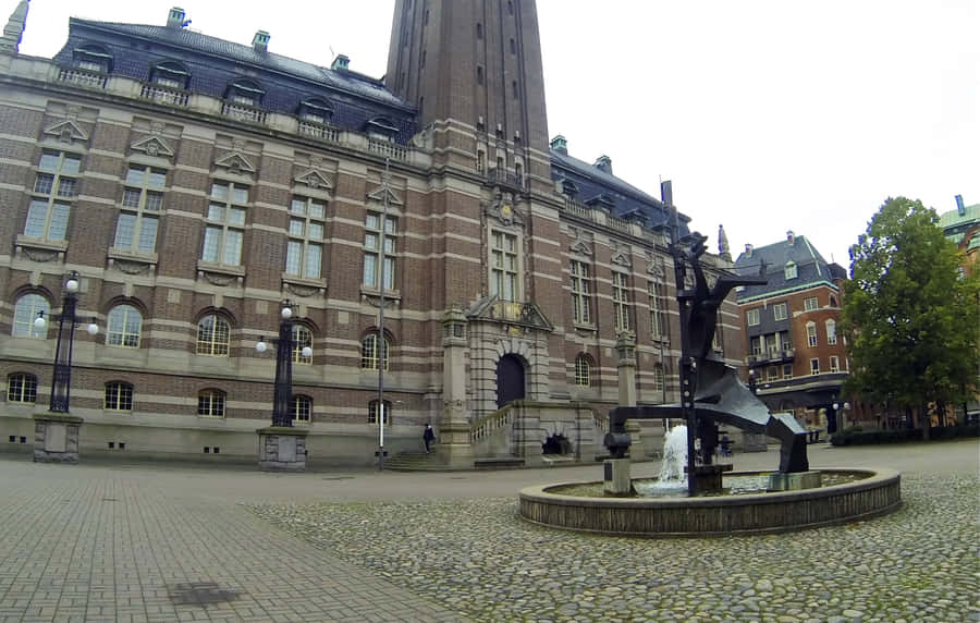 Stunning Sunset Over The Industrial Landscape Of Norrköping, Sweden Wallpaper