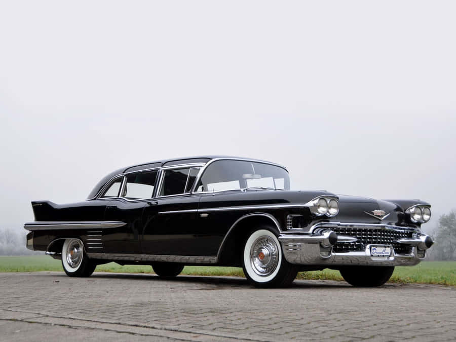 Stunning Vintage Cadillac Fleetwood In All Its Glory Wallpaper