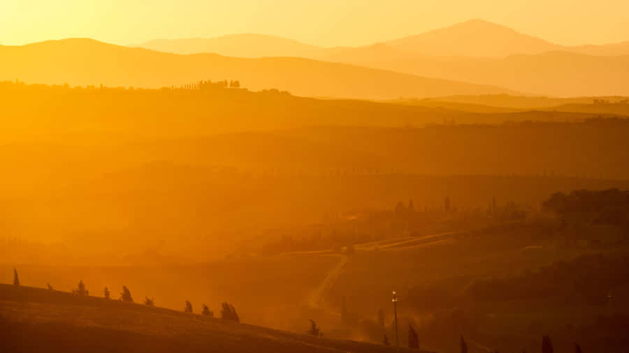 Stunning Yellow Sky At Sunset Wallpaper
