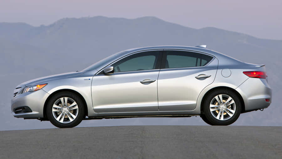 Stylish Acura Ilx On City Streets Wallpaper