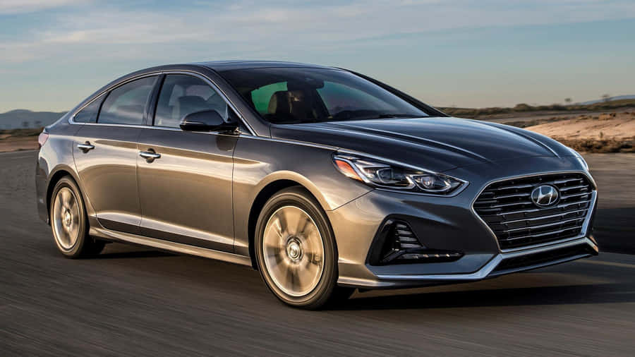 Stylish And Powerful Hyundai Sonata On Open Road Wallpaper