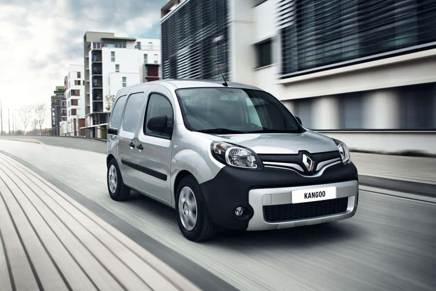Stylish And Versatile Renault Kangoo Parked In The City Wallpaper