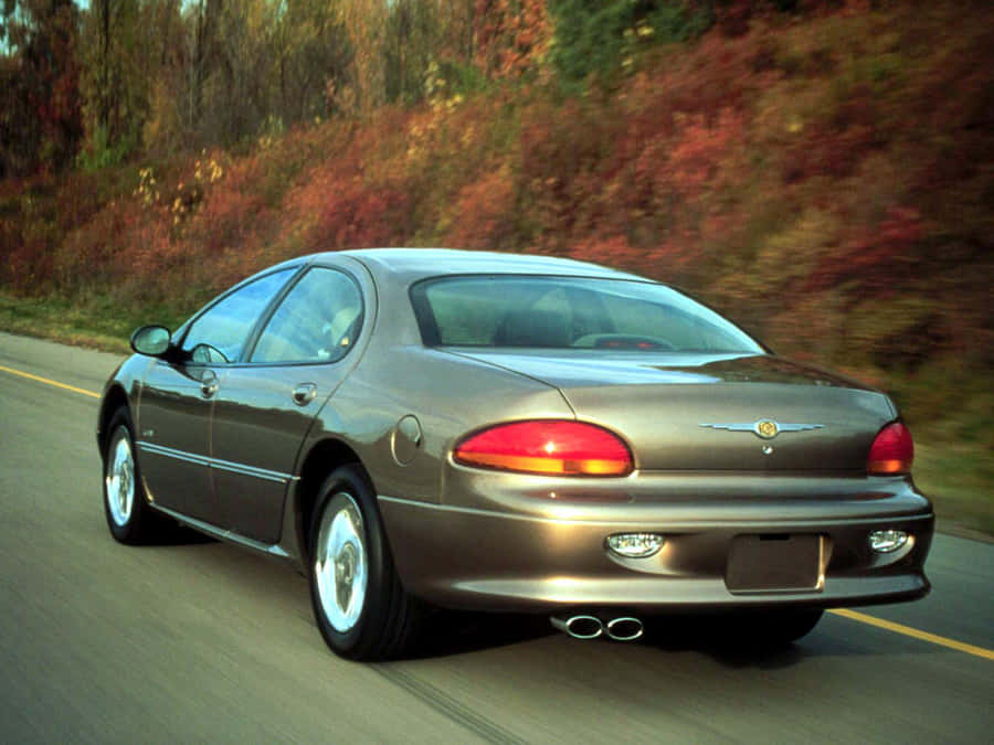 Stylish Chrysler Lhs On The Road Wallpaper