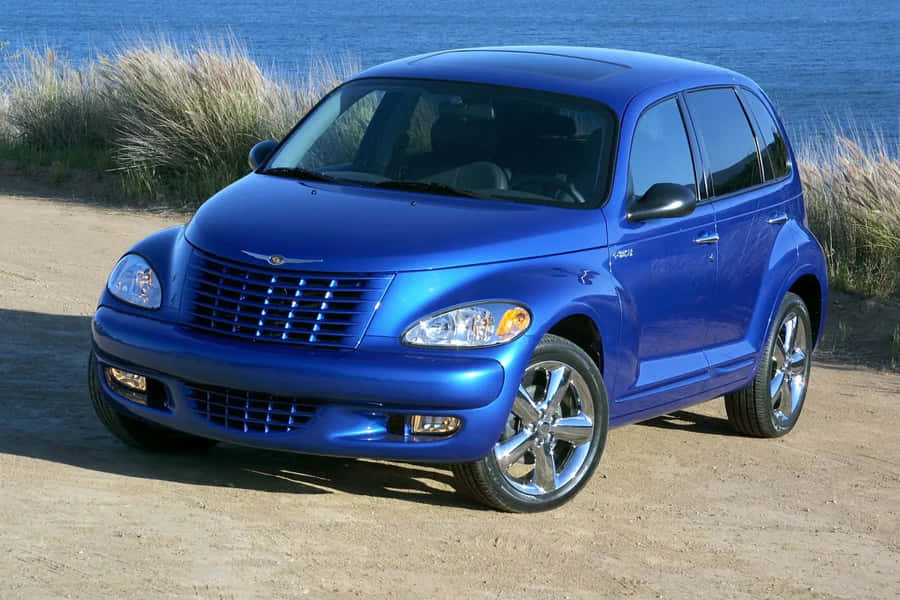 Stylish Chrysler Pt Cruiser On The Road Wallpaper