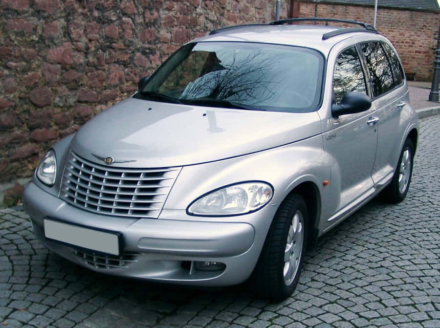 Stylish Chrysler Pt Cruiser On The Road Wallpaper