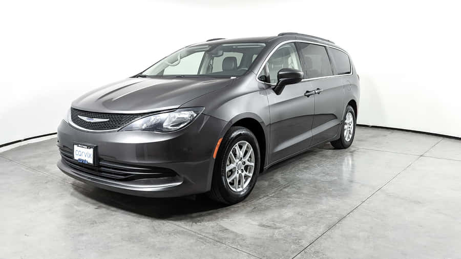 Stylish Chrysler Voyager On The Road Wallpaper