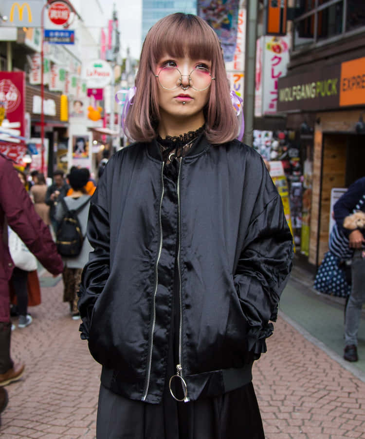 Stylish Friends Exploring Harajuku Fashion In Tokyo Wallpaper