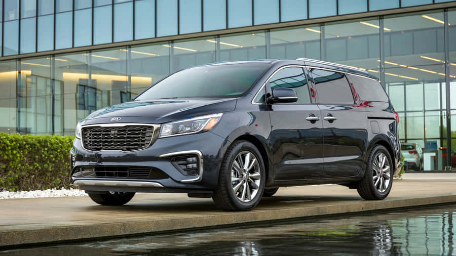Stylish Kia Sedona In Scenic Nature Wallpaper