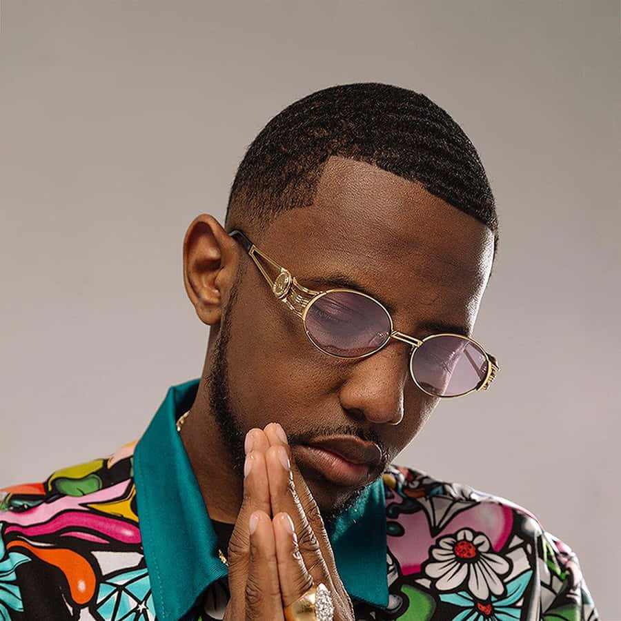 Stylish Man Praying Pose Wallpaper